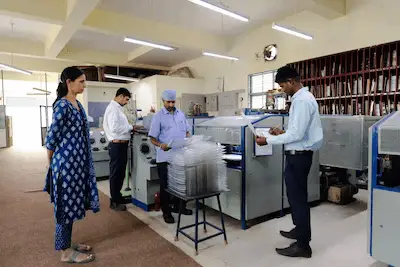 High-volume industrial packaging production with strict quality control